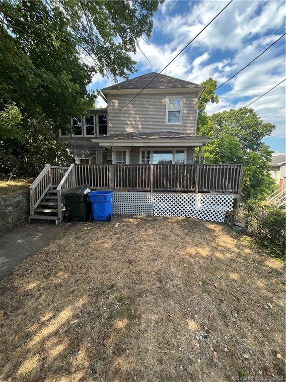 49 7th Street Norwich, CT 06360 - Photo 1 of 1 a front view of a house with a yard