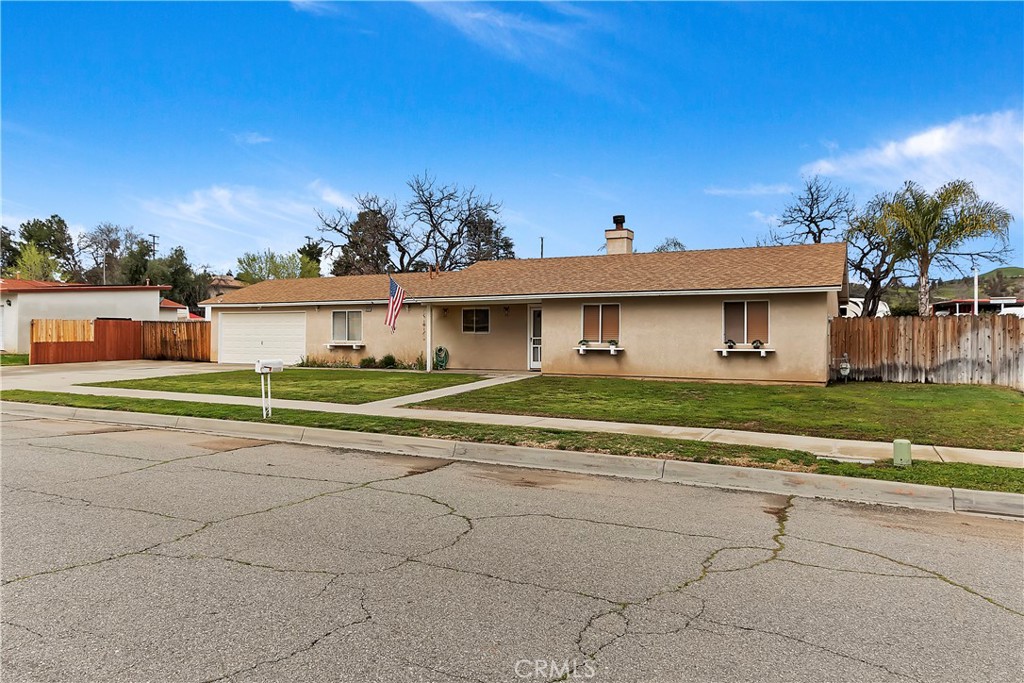 a view of a house with a big yard
