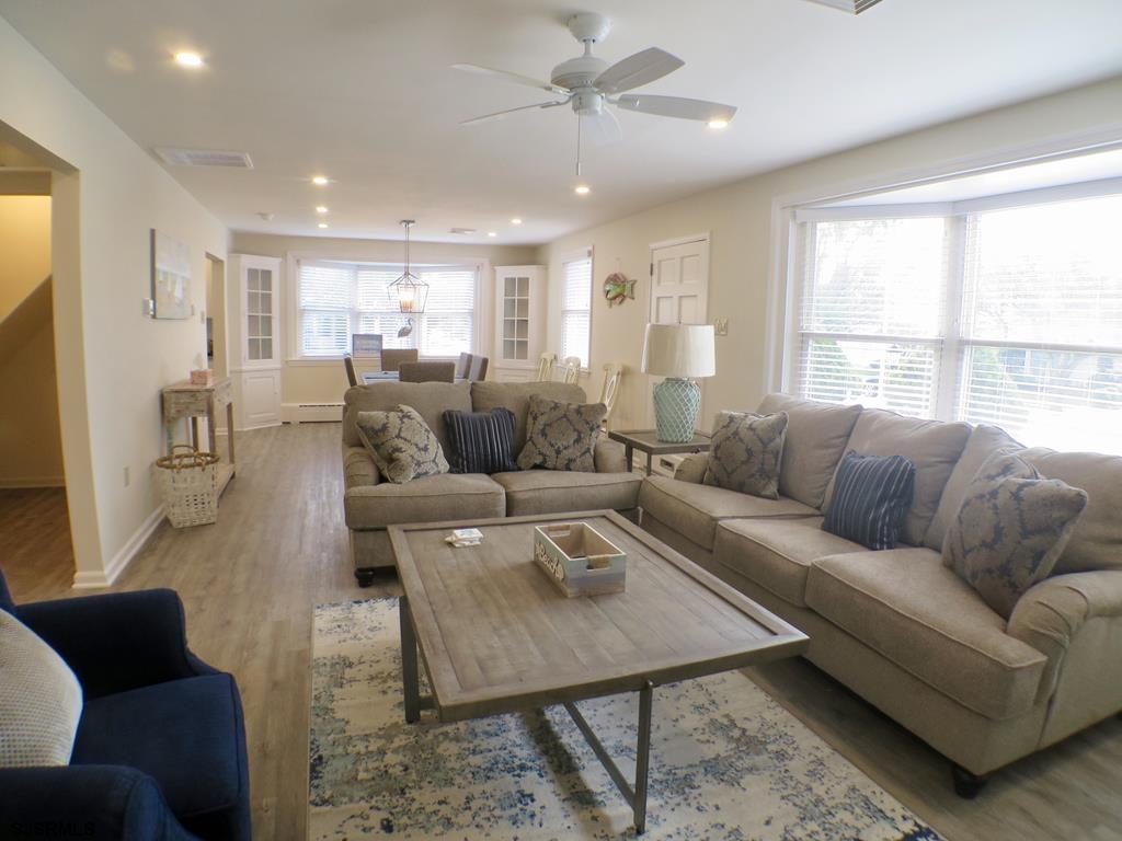 814 Wesley Road Ocean City, NJ 08226 - Photo 5 of 29 a living room with furniture and a large window