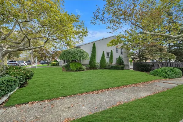 a view of a backyard with garden