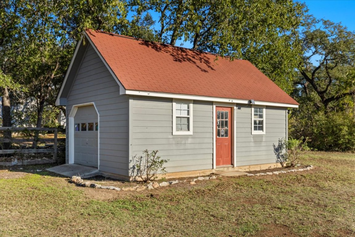 1180 Live Oak Loop Buda, TX 78610 - Photo 33 of 39 This extra "single car garage". has electricity and is on a slab. Ready for you to just put your finishing touches on it! Create the best office ever, or the most fun she shed or man cave or teen hangout. The possibilities are endless!