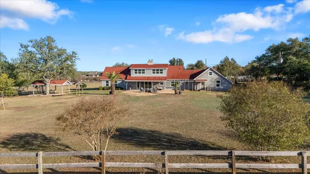 a view of a lake with a sitting area