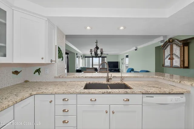 a bedroom with a bed and a cabinets
