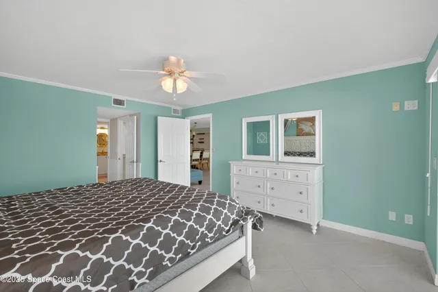 a picture of a bathroom with a shower and a mirror