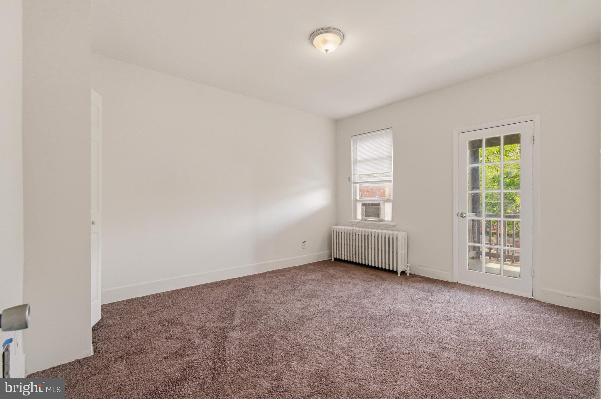 1616 Good Hope Road Southeast Washington, DC 20020 - Photo 13 of 25 an empty room with windows