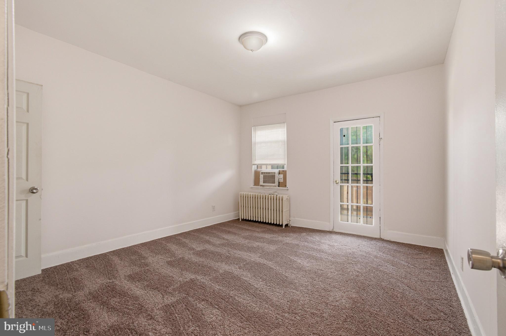1616 Good Hope Road Southeast Washington, DC 20020 - Photo 14 of 25 an empty room with windows