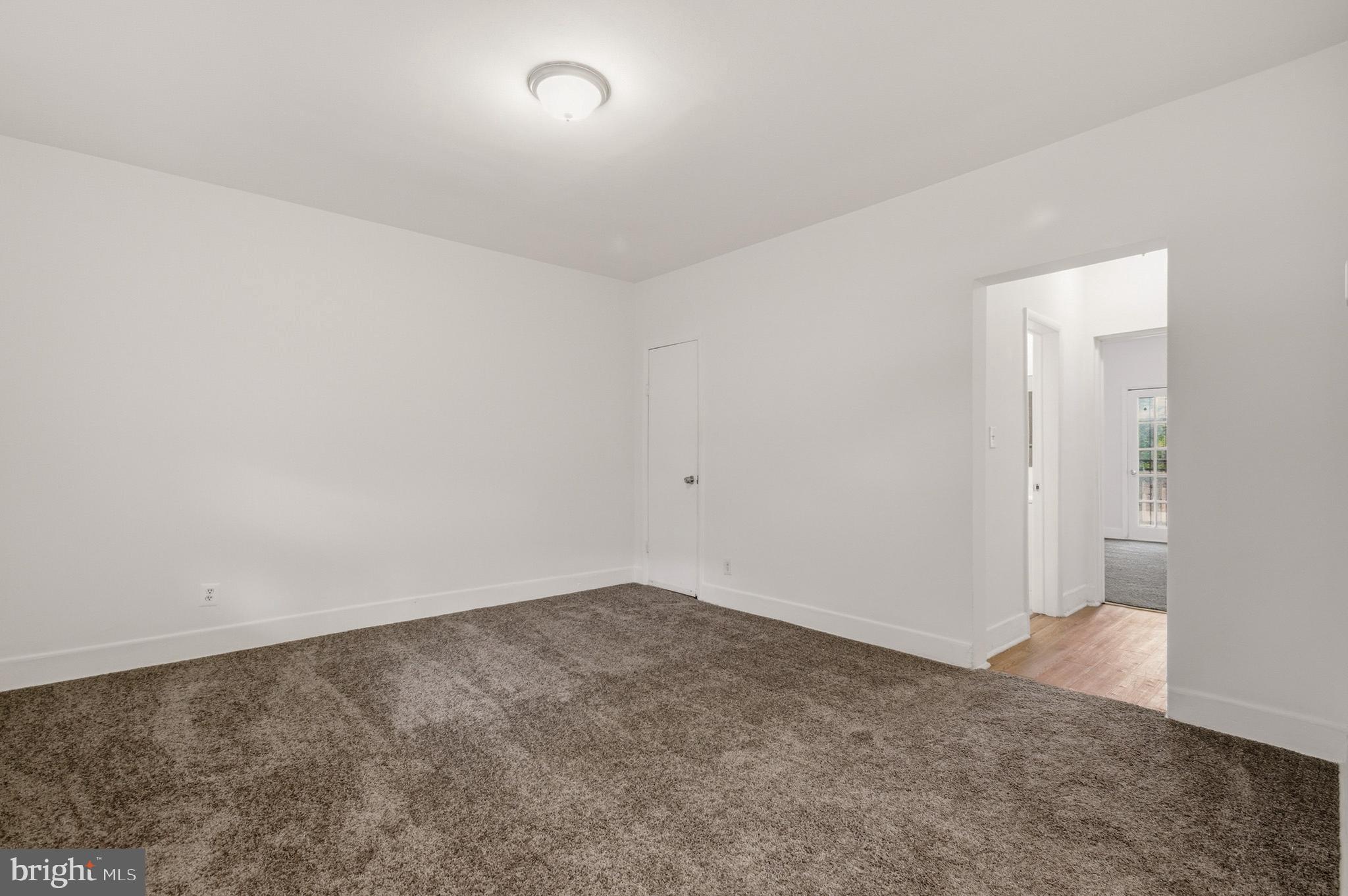 1616 Good Hope Road Southeast Washington, DC 20020 - Photo 4 of 25 an empty room with an entryway