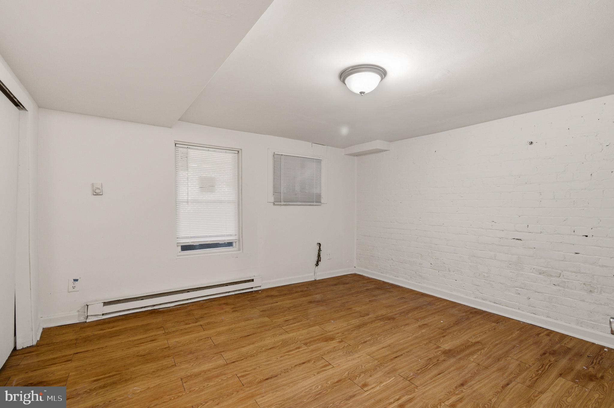 1616 Good Hope Road Southeast Washington, DC 20020 - Photo 8 of 25 an empty room with a workbench