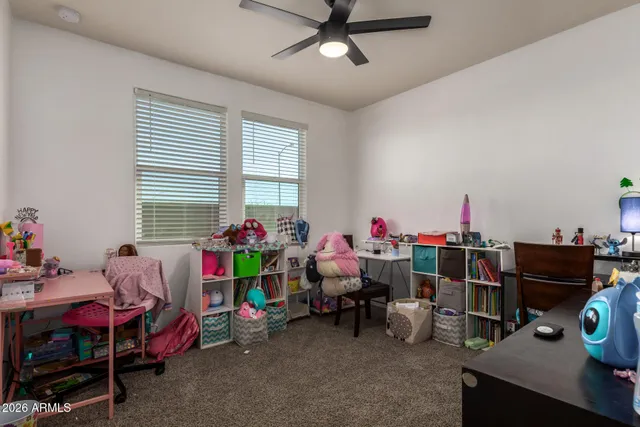 a view of a workspace with furniture