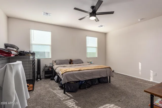a kitchen with a refrigerator and a sink