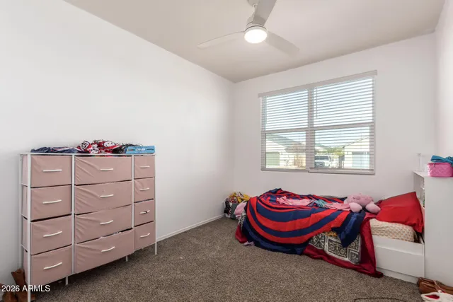 an empty room with closet area