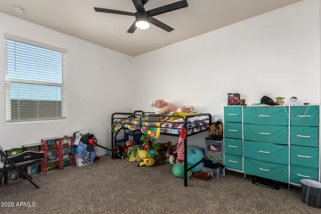 a view of a livingroom with furniture and windows