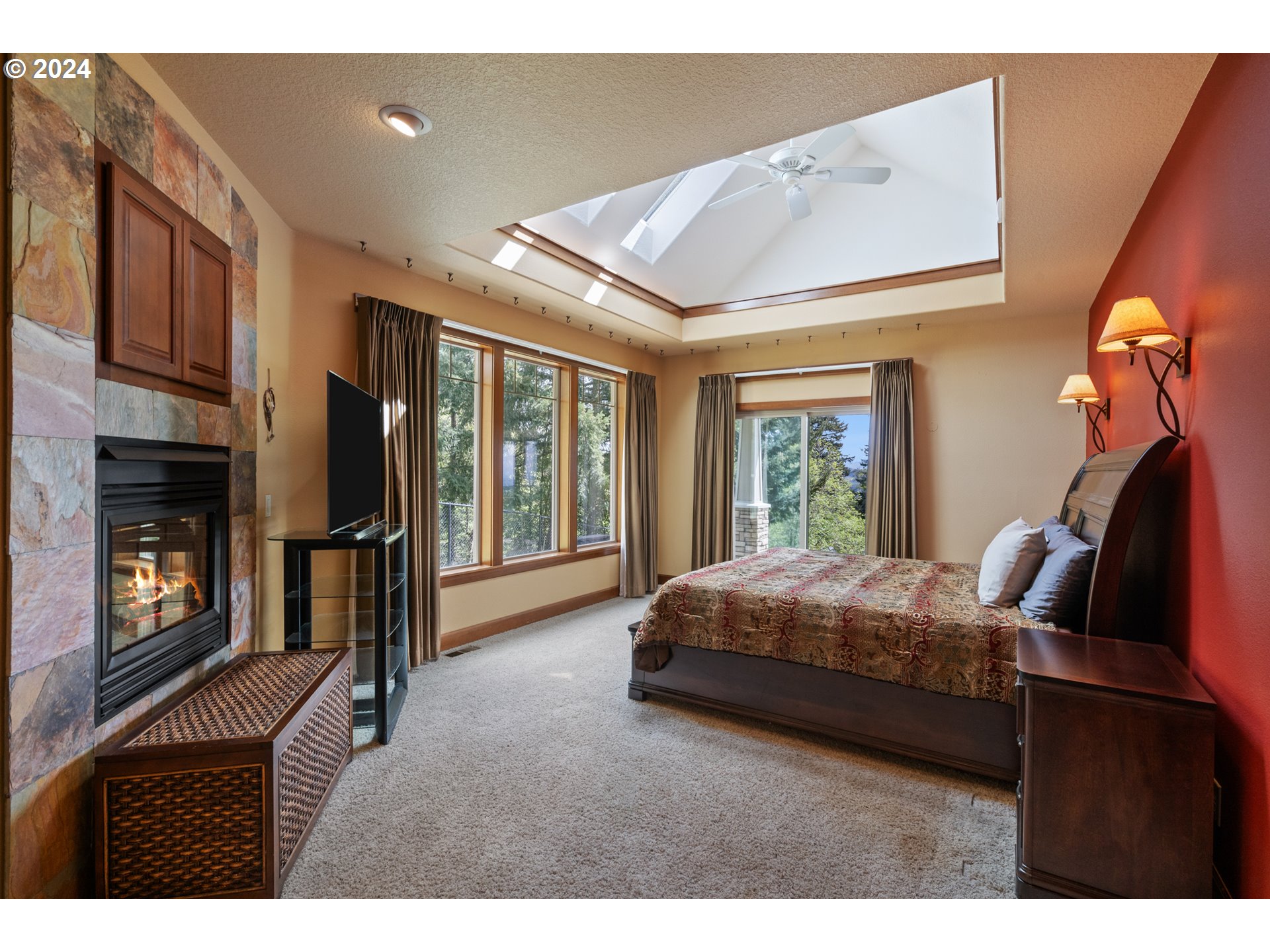 5924 Northeast Lessard Road Camas, WA 98607 - Photo 15 of 48 a bed room with a bed and a television