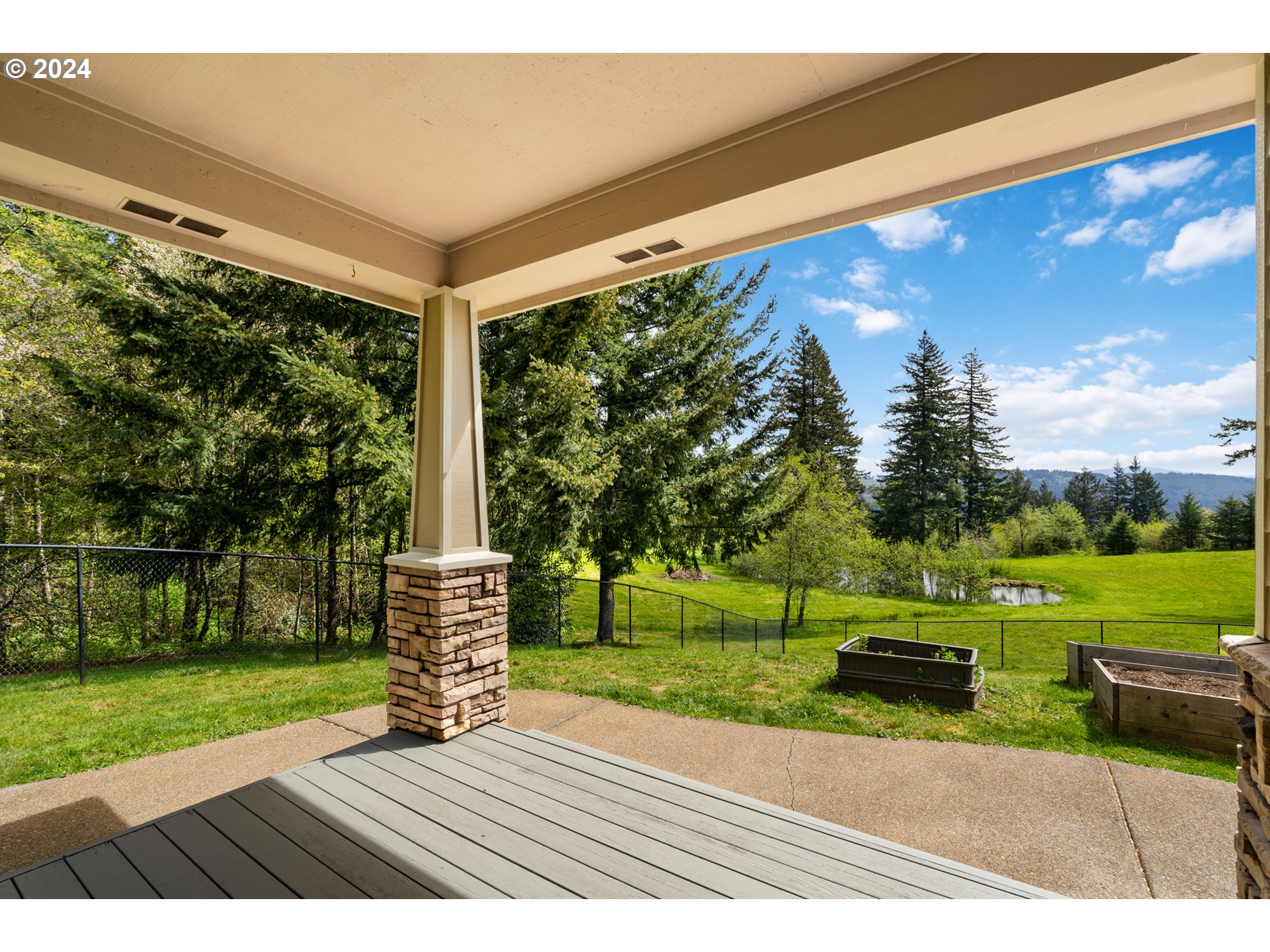 5924 Northeast Lessard Road Camas, WA 98607 - Photo 30 of 48 a view of a back yard with a garden and plants