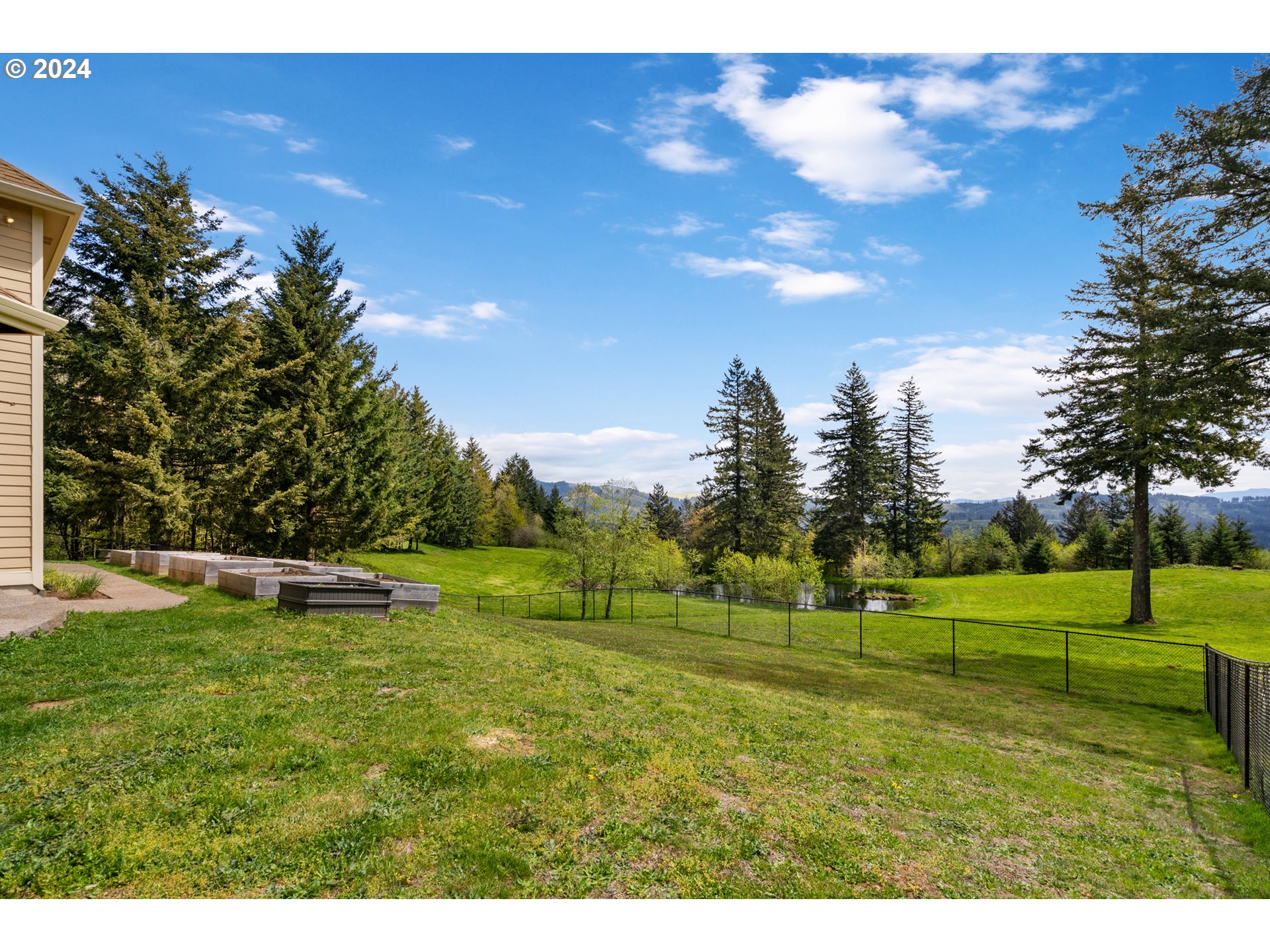 5924 Northeast Lessard Road Camas, WA 98607 - Photo 34 of 48 a view of a golf course with a lake