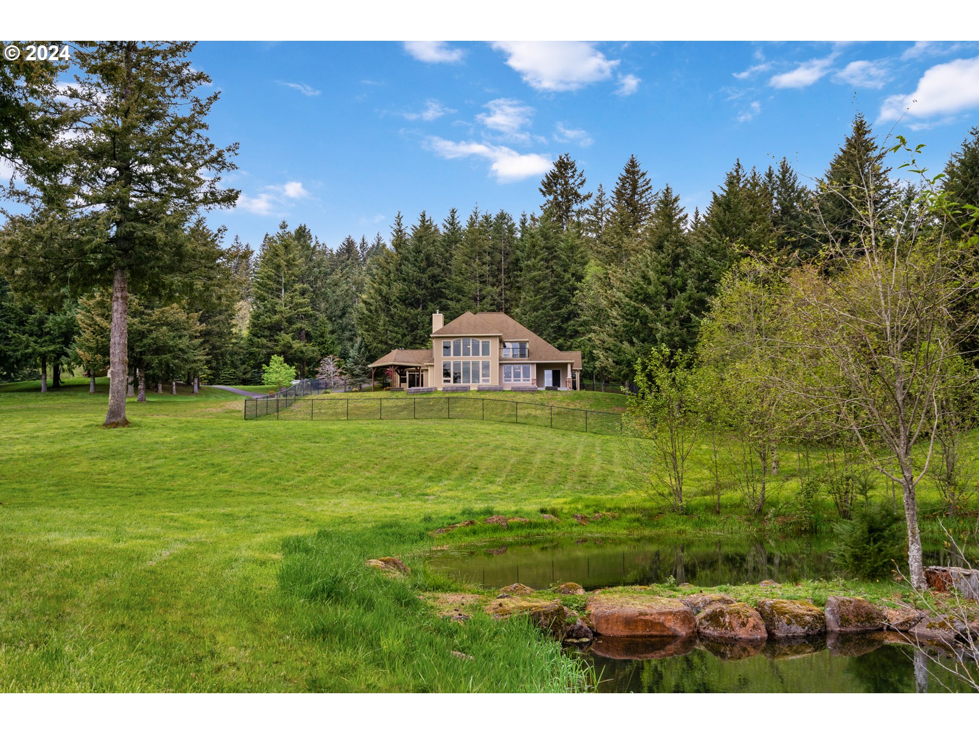 5924 Northeast Lessard Road Camas, WA 98607 - Photo 46 of 48 a view of a golf course with a trees