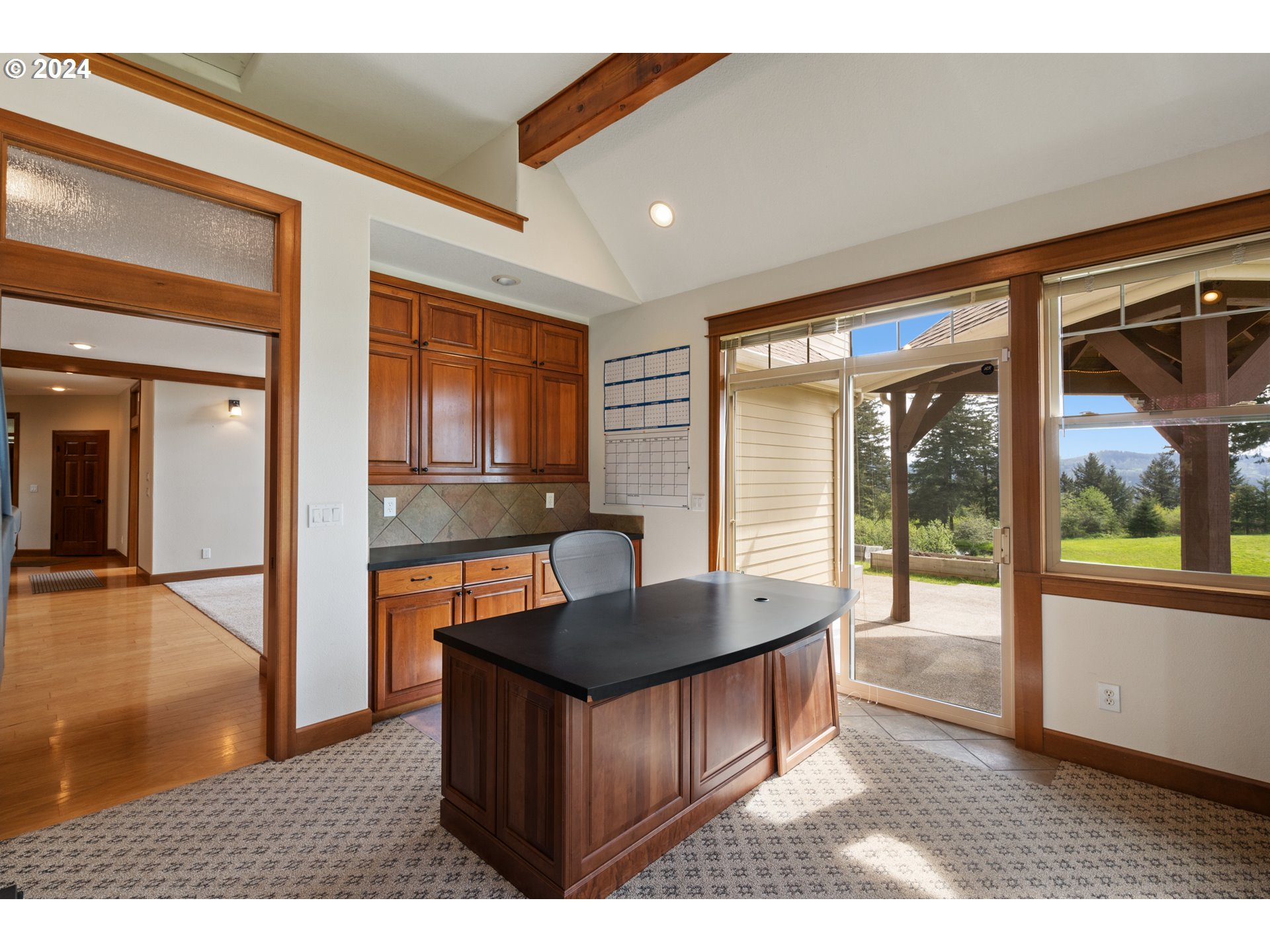 5924 Northeast Lessard Road Camas, WA 98607 - Photo 6 of 48 a living room with kitchen island granite countertop furniture and a large window