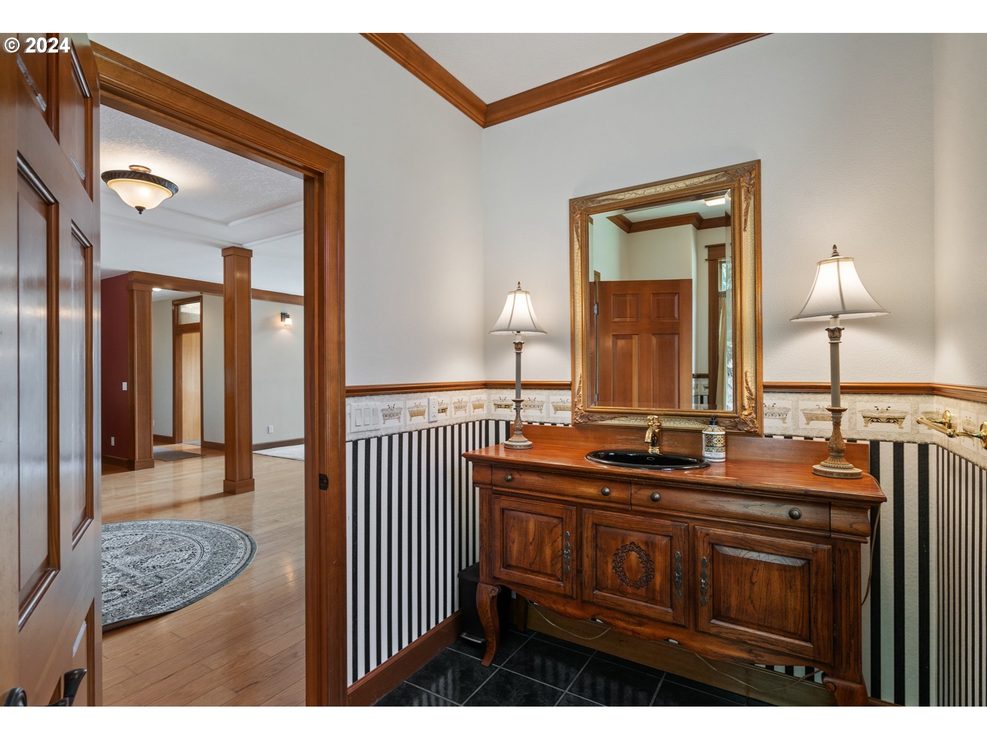 5924 Northeast Lessard Road Camas, WA 98607 - Photo 8 of 48 a bathroom with a sink a vanity and a mirror