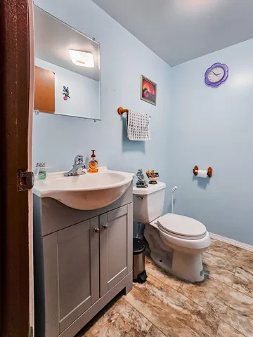 a bathroom with a sink and a toilet