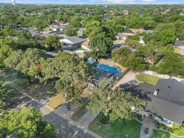 an aerial view of residential house with outdoor space