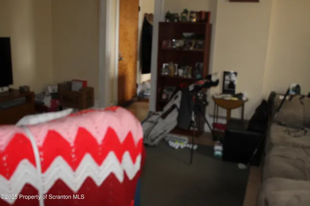 a bedroom with a bed and a closet