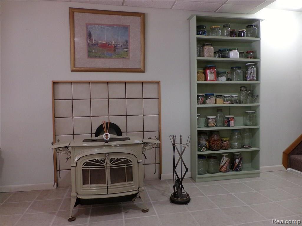 9169 Mabley Hill Road Fenton, MI 48430 - Photo 19 of 33 19 LL Wood Stove_ 9169 Mabley Hill 180.JPG