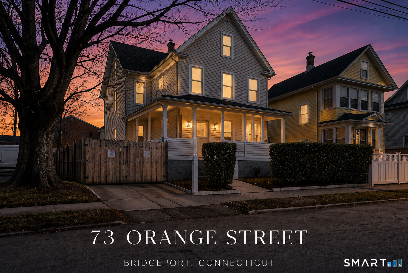 73 Orange Street Bridgeport, CT 06607 - Photo 1 of 33 a front view of a house with a garden