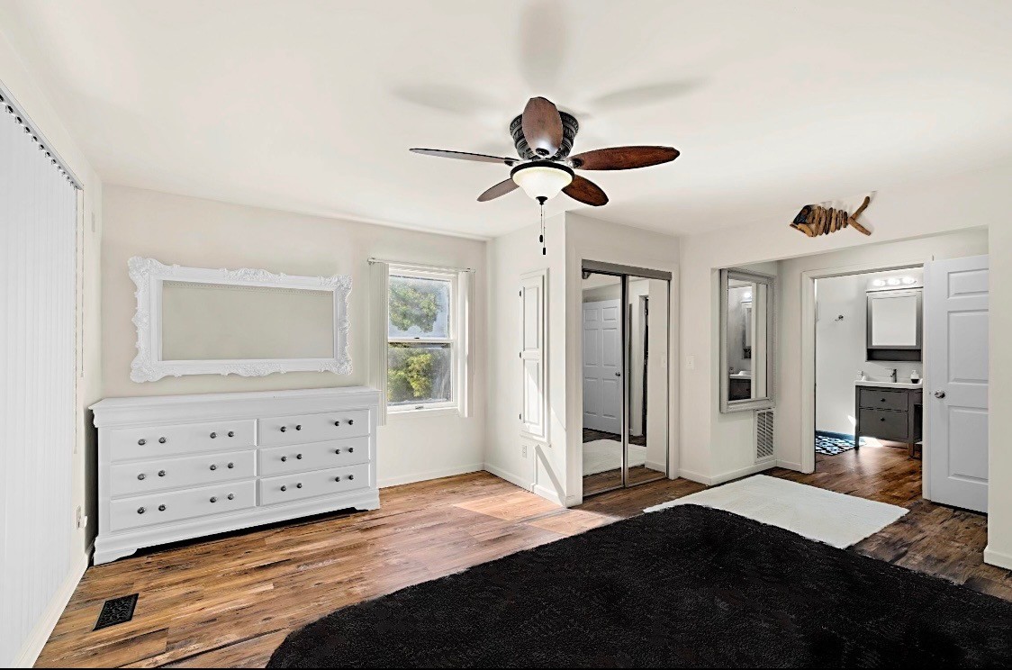 395 Carroll Gentry Road Madisonville, KY 42431 - Photo 22 of 46 a bedroom with a bed and a dresser
