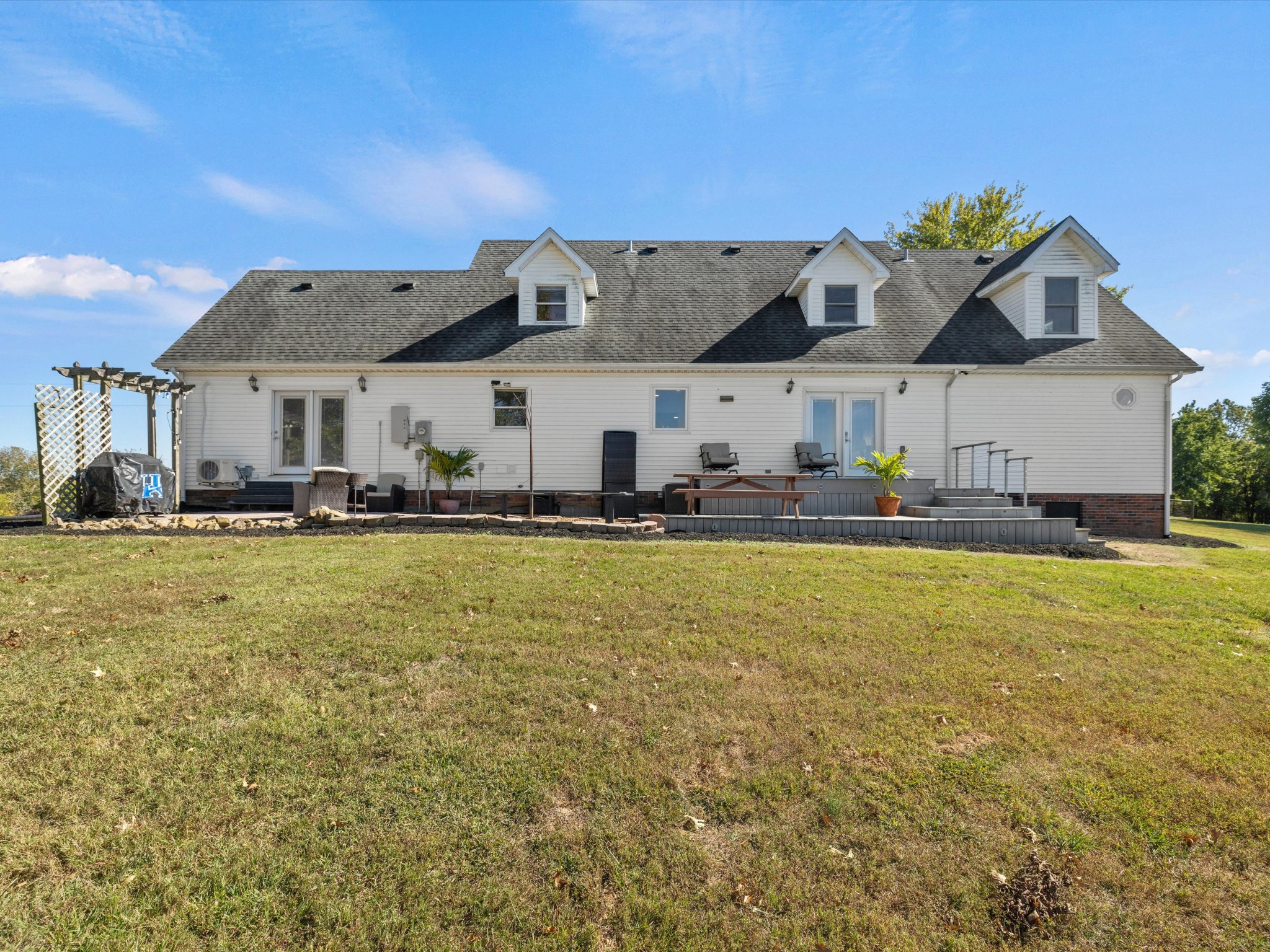 395 Carroll Gentry Road Madisonville, KY 42431 - Photo 33 of 46 a front view of house with yard and outdoor seating
