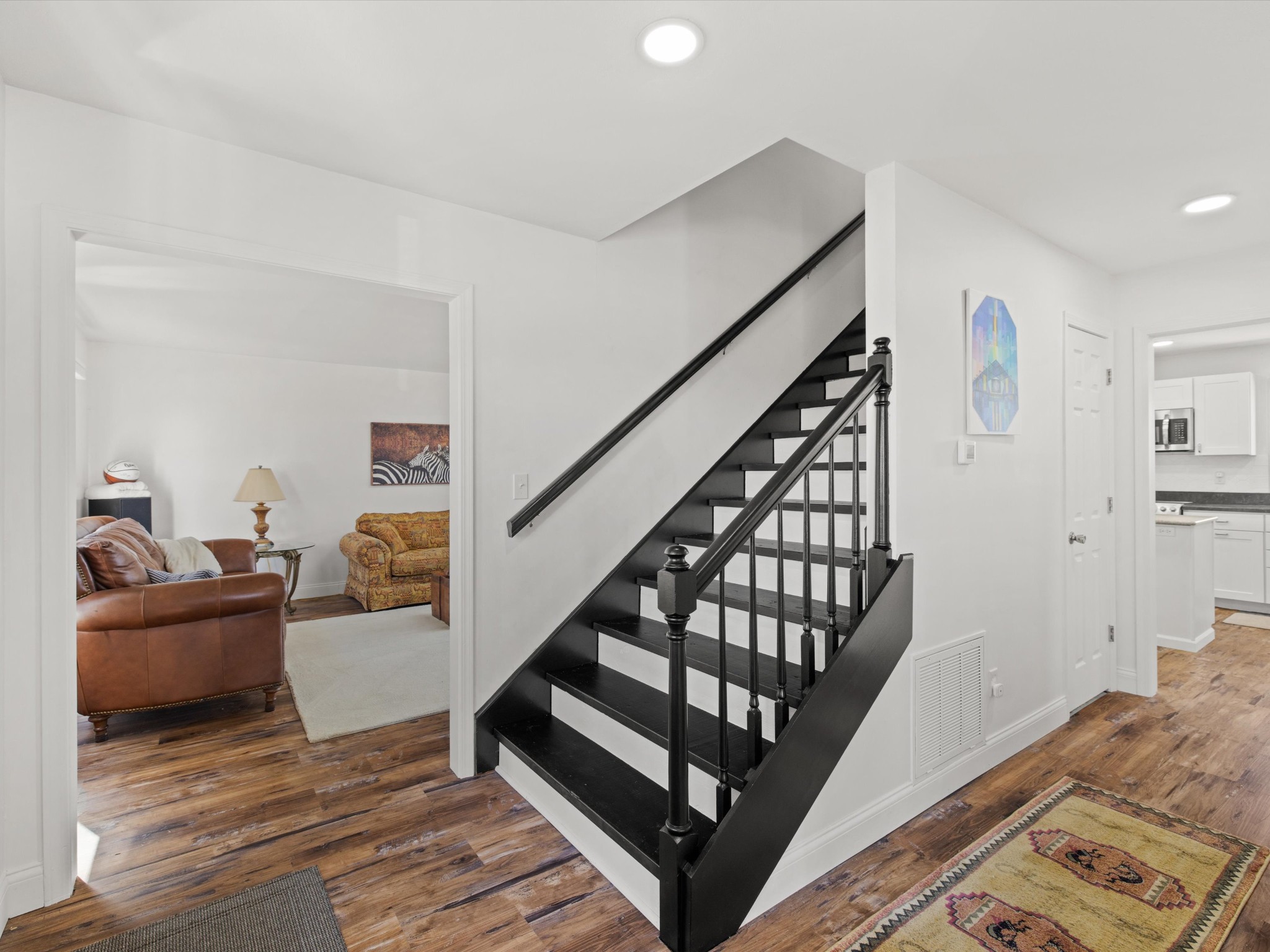 395 Carroll Gentry Road Madisonville, KY 42431 - Photo 4 of 46 a living room with furniture and wooden floor