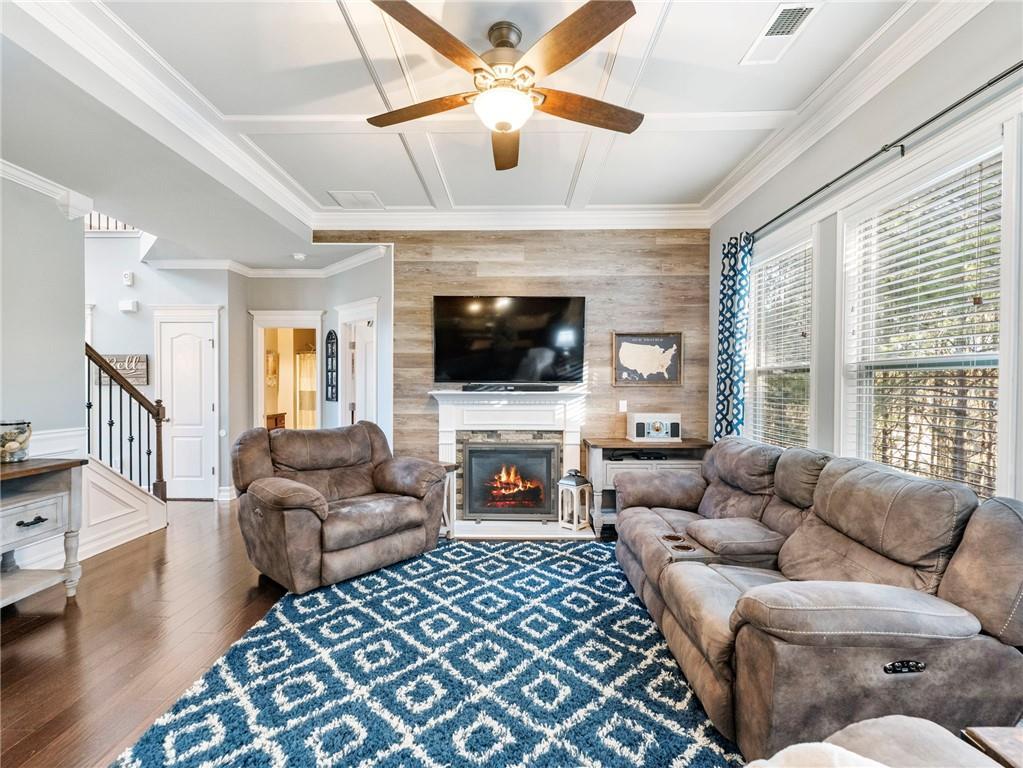 2939 Estate View Court Dacula, GA 30019 - Photo 11 of 73 a living room with fireplace furniture and a flat screen tv