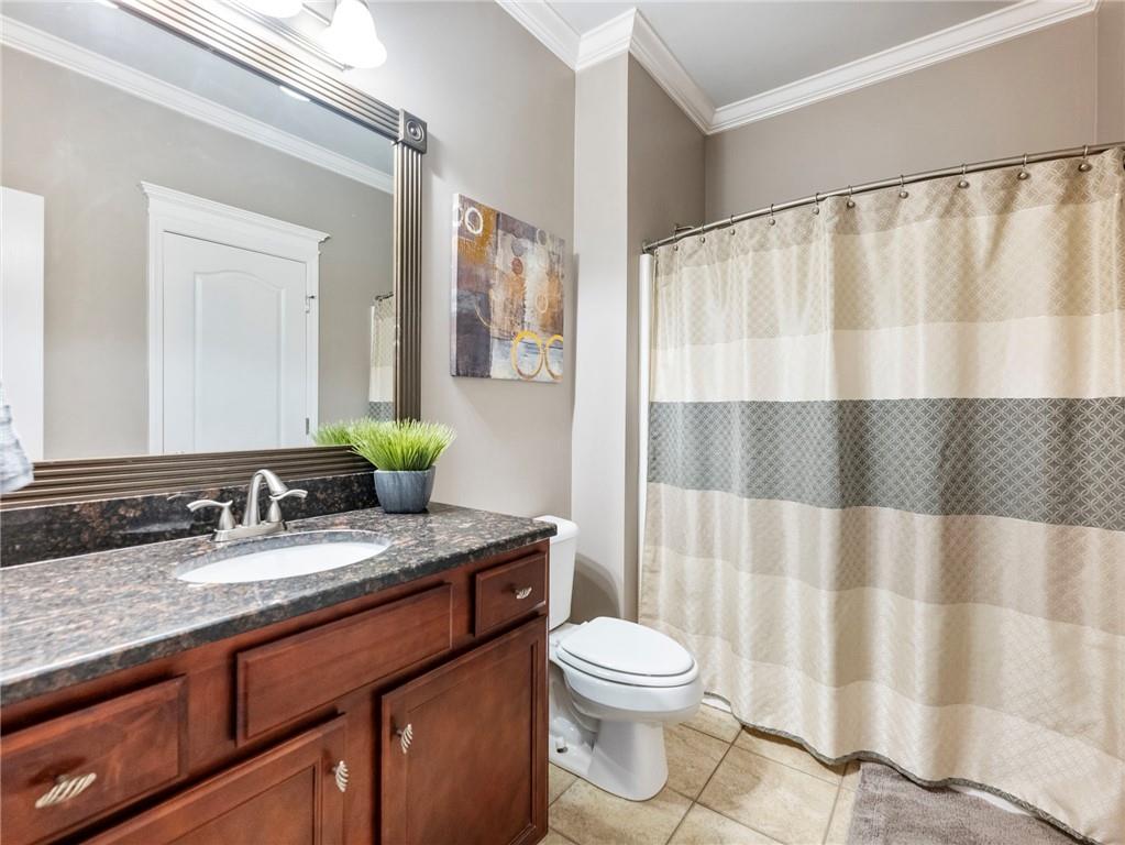 2939 Estate View Court Dacula, GA 30019 - Photo 13 of 73 a bathroom with a granite countertop sink and a mirror