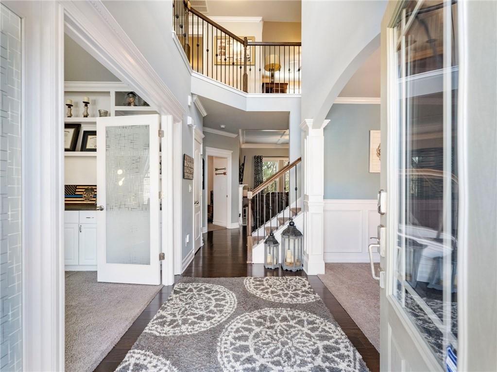 2939 Estate View Court Dacula, GA 30019 - Photo 2 of 73 a view of entryway and hall with wooden floor
