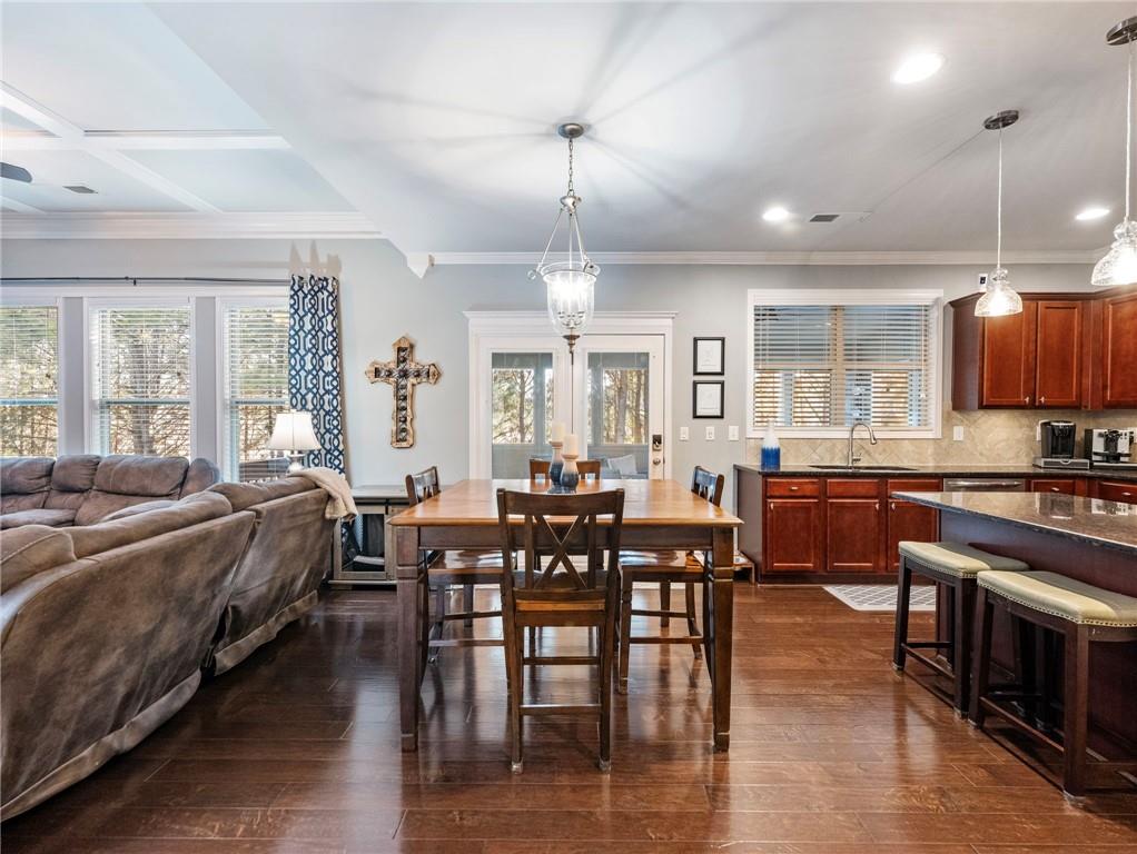 2939 Estate View Court Dacula, GA 30019 - Photo 21 of 73 a view of a dining room with furniture window and wooden floor