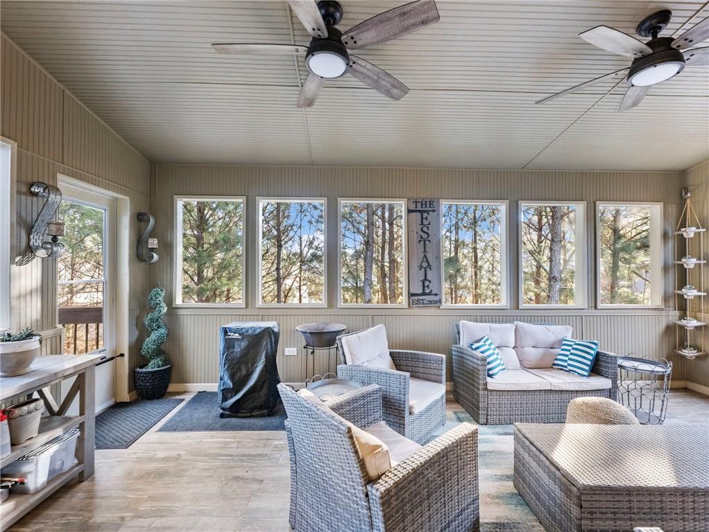 2939 Estate View Court Dacula, GA 30019 - Photo 22 of 73 a living room with furniture and a large window