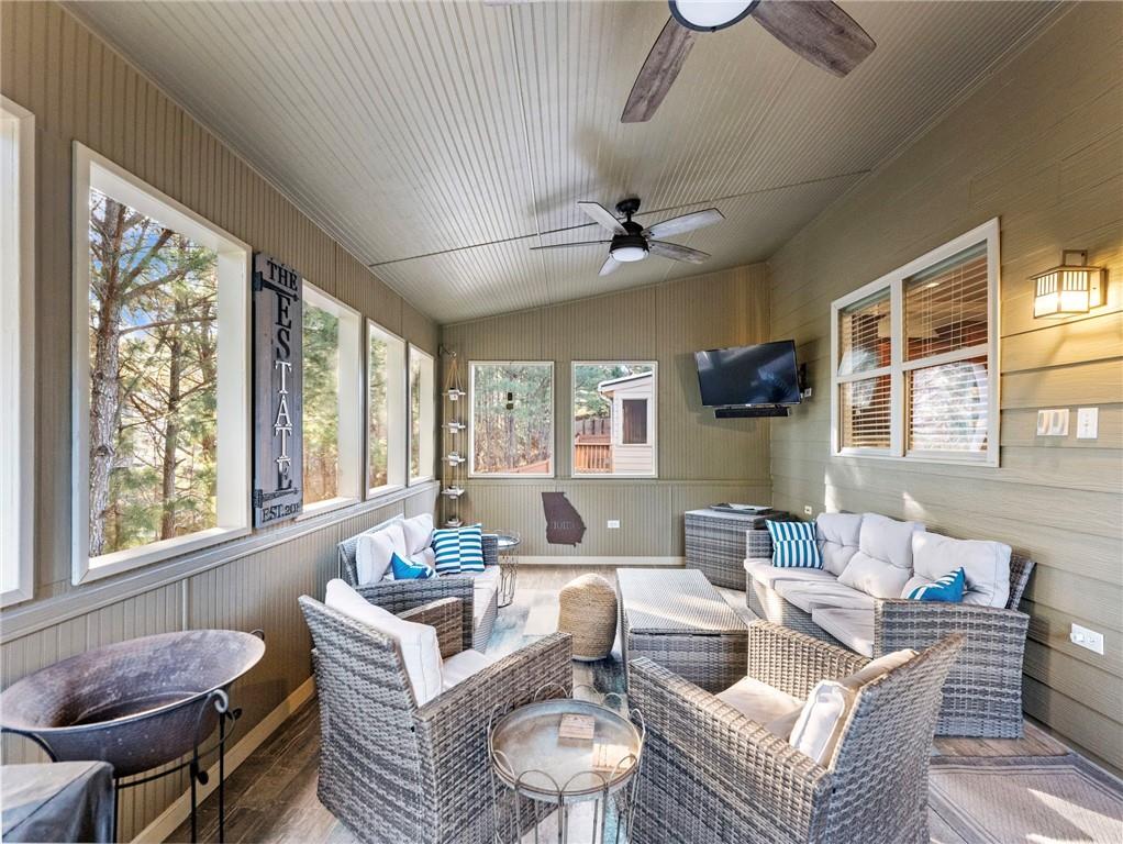 2939 Estate View Court Dacula, GA 30019 - Photo 23 of 73 a living room with furniture and a large window