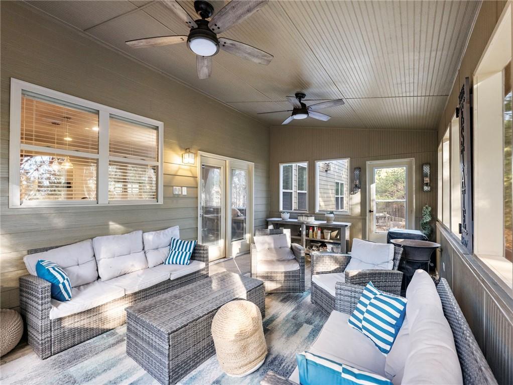 2939 Estate View Court Dacula, GA 30019 - Photo 24 of 73 a living room with furniture and a large window