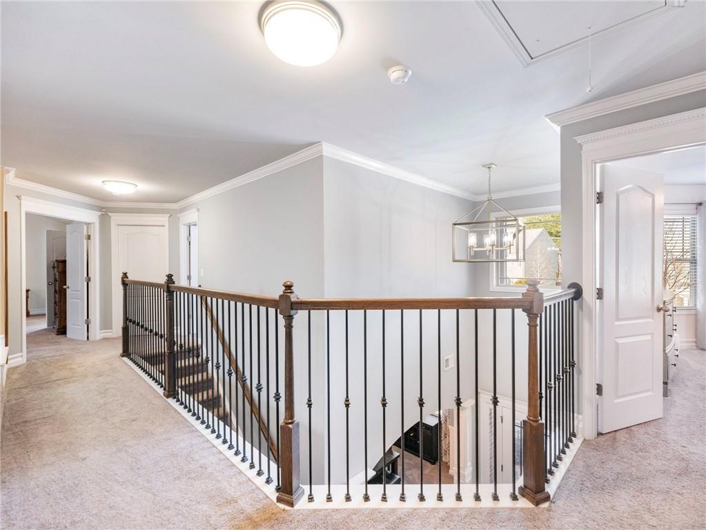 2939 Estate View Court Dacula, GA 30019 - Photo 26 of 73 a view of a hallway with windows