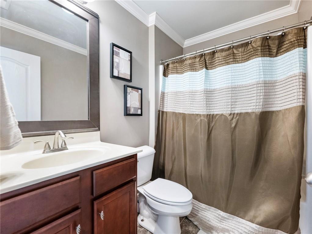 2939 Estate View Court Dacula, GA 30019 - Photo 41 of 73 a bathroom with a sink and a mirror