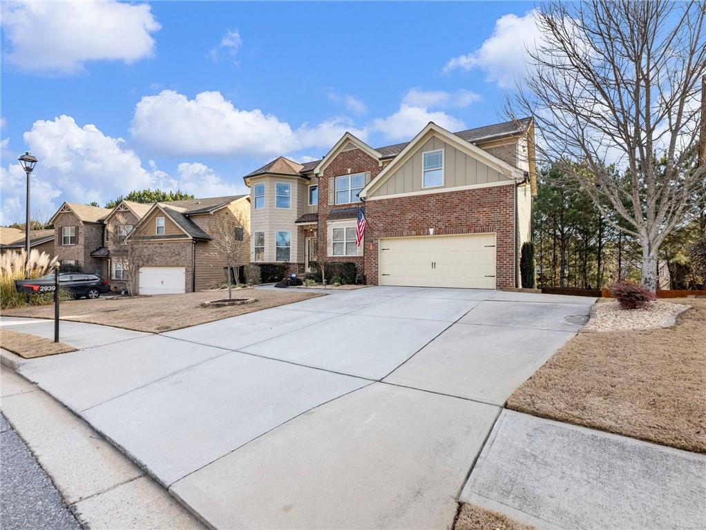 2939 Estate View Court Dacula, GA 30019 - Photo 58 of 73 a view of the house with a yard