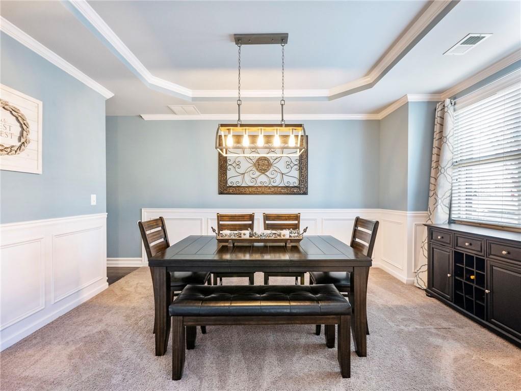 2939 Estate View Court Dacula, GA 30019 - Photo 7 of 73 a view of a dining room with furniture and window