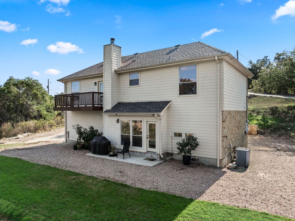 14000 Saskatchewan Drive Austin, TX 78734 - Photo 25 of 27 a view of a house with backyard and sitting area