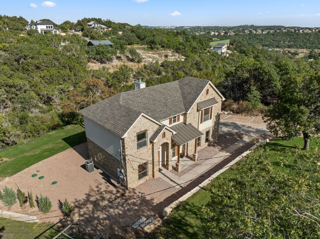 14000 Saskatchewan Drive Austin, TX 78734 - Photo 26 of 27 an aerial view of a house with a yard