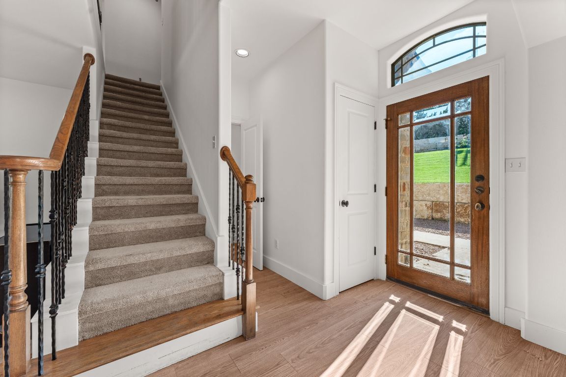 14000 Saskatchewan Drive Austin, TX 78734 - Photo 4 of 27 a view of an entryway with wooden floor and door