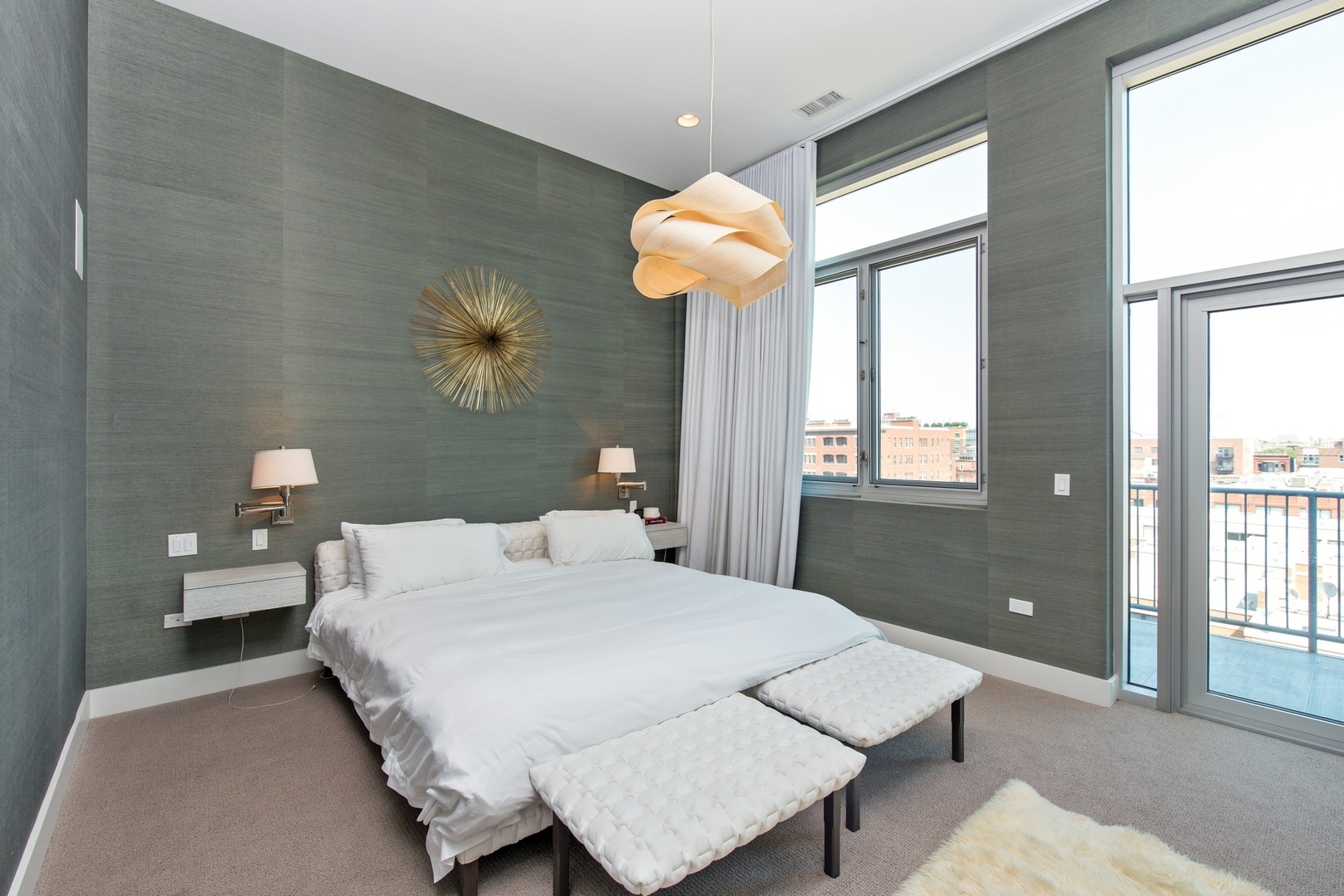 1124 West Adams Street, Unit PHW Chicago, IL 60607 - Photo 11 of 55 a bedroom with a bed and a chandelier