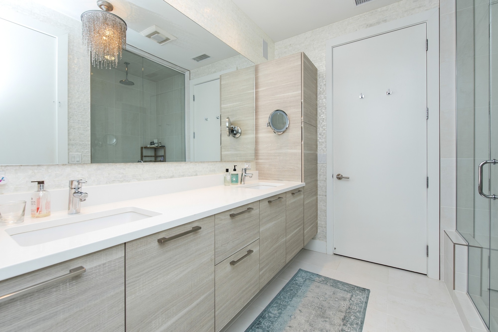 1124 West Adams Street, Unit PHW Chicago, IL 60607 - Photo 13 of 55 a bathroom with double sink and a mirror