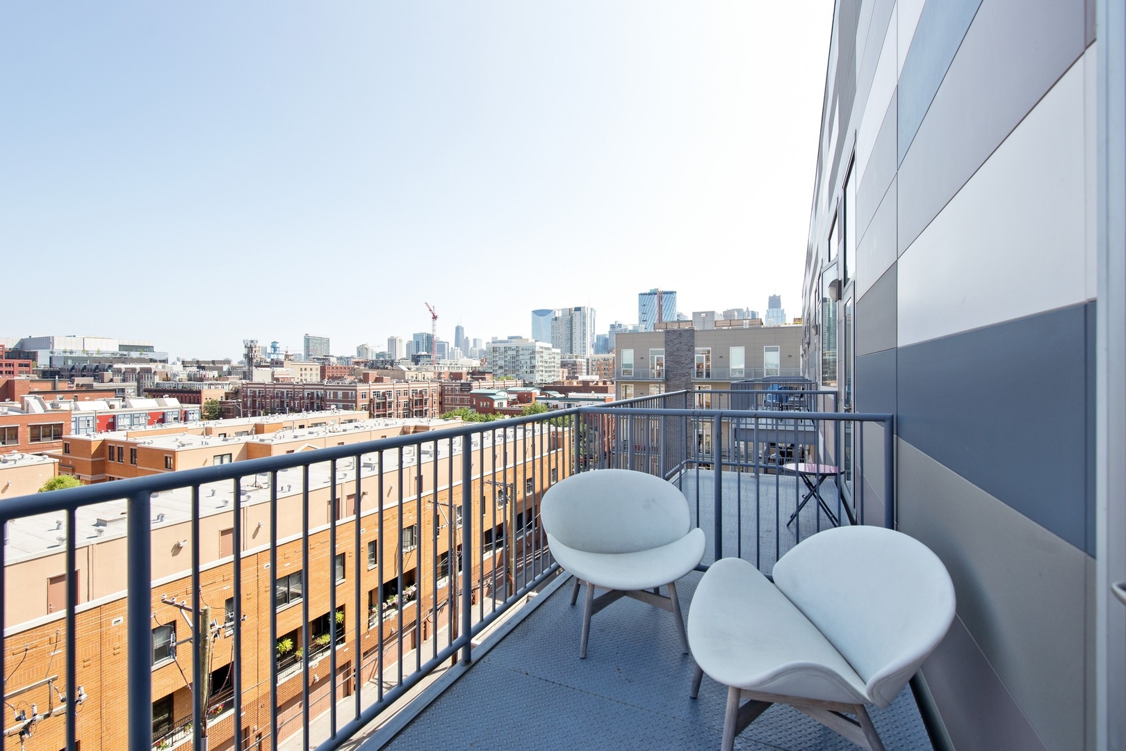 1124 West Adams Street, Unit PHW Chicago, IL 60607 - Photo 18 of 55 a view of a chairs in balcony