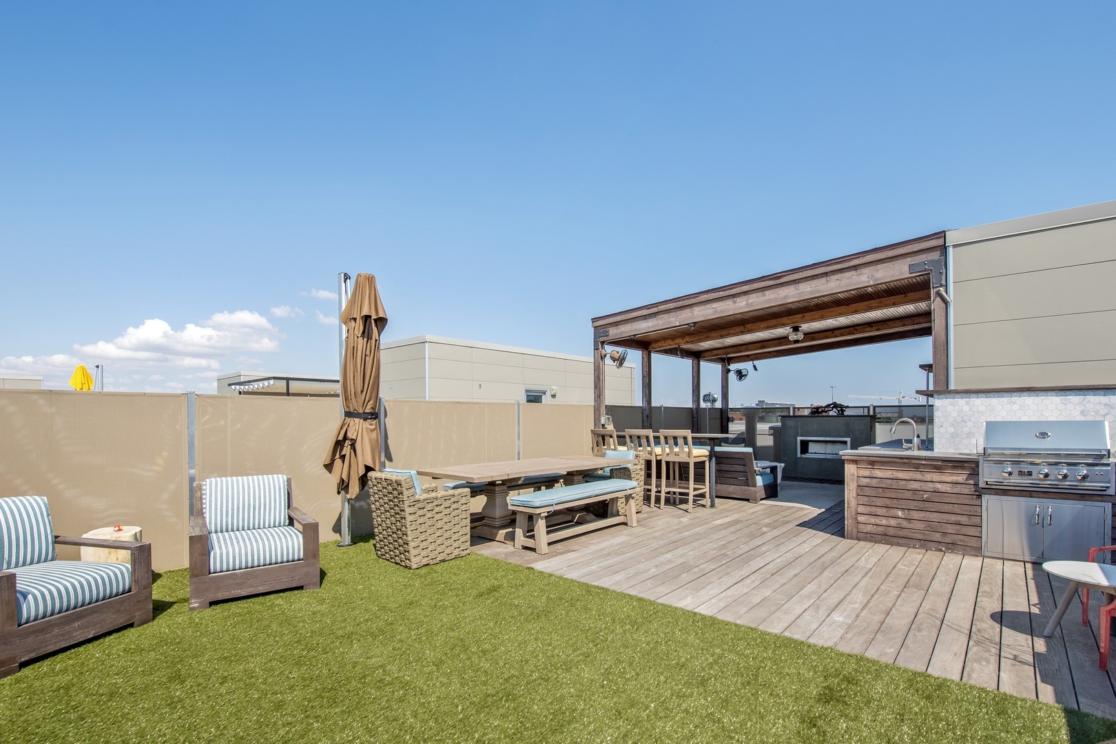 1124 West Adams Street, Unit PHW Chicago, IL 60607 - Photo 24 of 55 a living room with furniture a rug and white walls