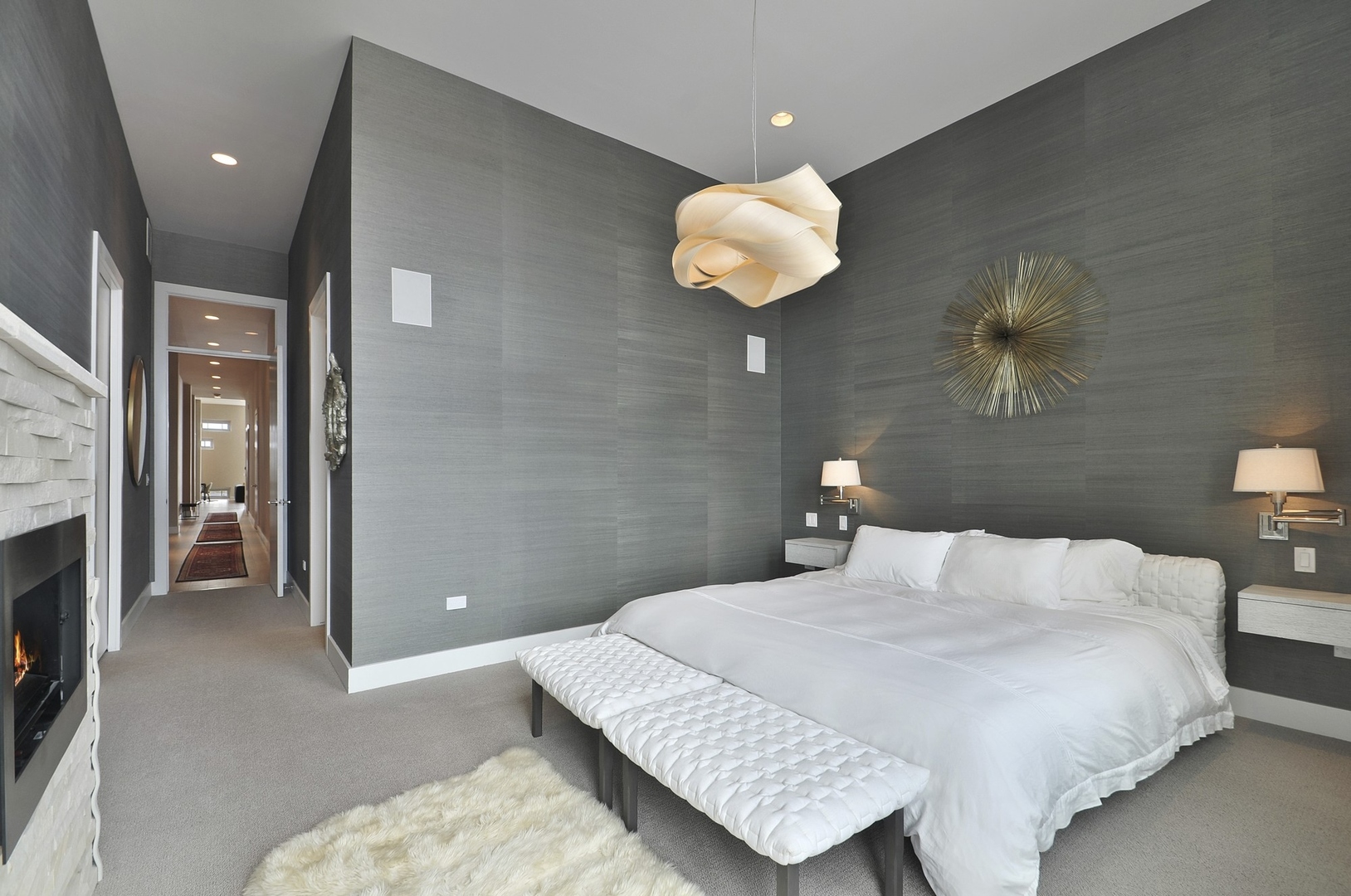 1124 West Adams Street, Unit PHW Chicago, IL 60607 - Photo 35 of 55 a bedroom with a bed and a chandelier