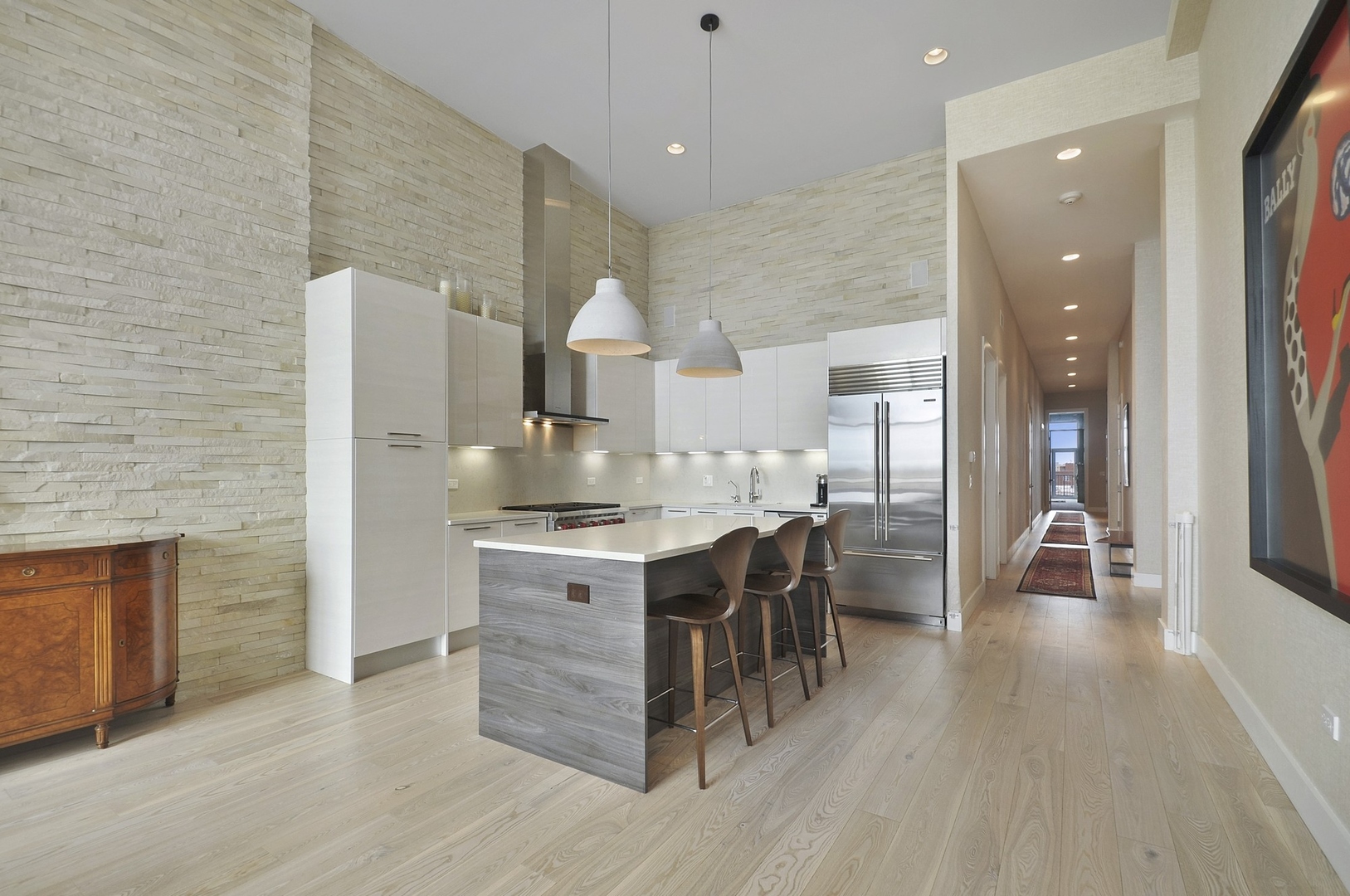 1124 West Adams Street, Unit PHW Chicago, IL 60607 - Photo 40 of 55 a kitchen with stainless steel appliances granite countertop a sink stove and refrigerator